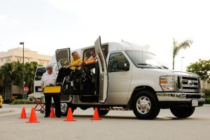 ADA van accessible parking space with wheelchair lift deployed - ada van accessible parking requirements