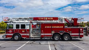 fire truck navigating a parking lot during an emergency response - what is a fire lane in a parking lot