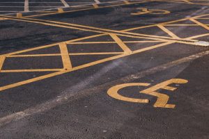 ADA compliant parking lot with accessible spaces and signage