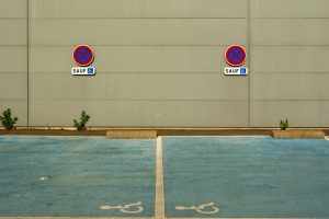 ADA parking lot signage requirements compliant commercial parking lot