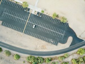 sealcoating and crack filling asphalt parking lot