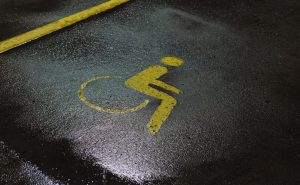 Freshly applied parking lot stencils and pavement markings
